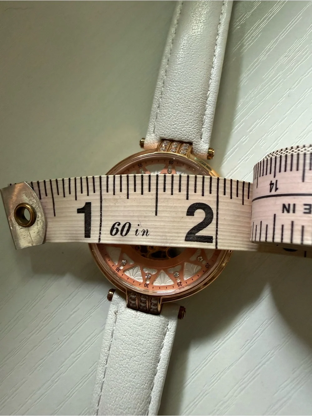 Bureau Rose Gold Skeleton Dial Watch with White leather Strap